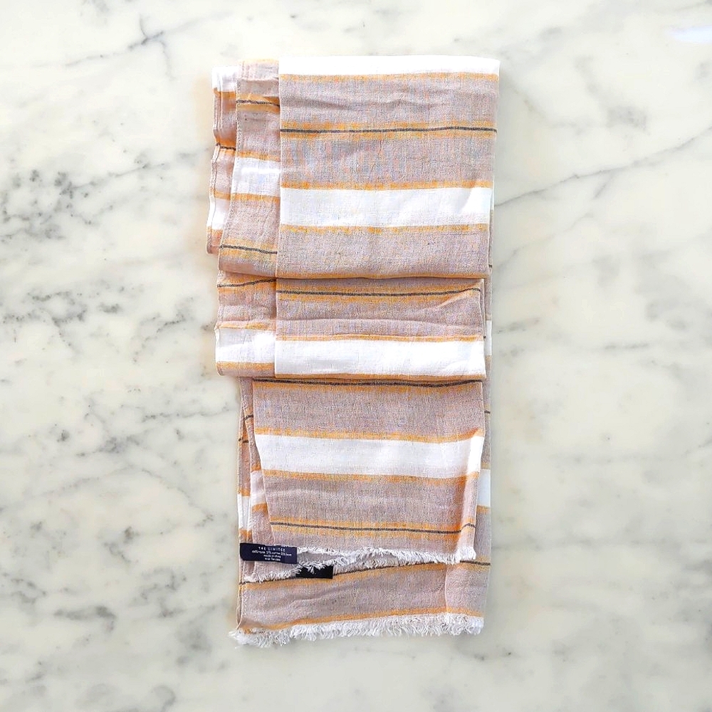 NWT. The Limited Linen/Rayon/Cotton blended scarf/wrap with multi color stripes.